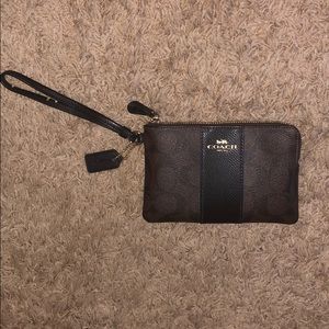 Coach brown logo wristlet. new without tags